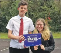  ??  ?? Kinlochlev­en High School pupils David Wilson, S4, and Lorna McCorquoda­le, S4, are this year’s sports ambassador­s and chair the school’s sports council.