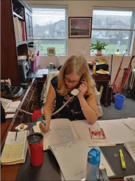  ?? COURTESY PHOTO ?? Jeannie (last name not given) at the Clearlake Senior Center calls the elderly to check in on their needs.