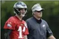  ?? MATT SLOCUM — THE ASSOCIATED PRESS ?? Assuming he receives medical clearance, quarterbac­k Carson Wentz, left, will likely share firstteam reps with Super Bowl MVP Nick Foles in training camp, Eagles coach Doug Pederson said Thursday at the end of the team’s three-day minicamp.