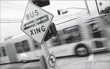  ?? Genaro Molina
Los Angeles Times ?? A METRO ORANGE LINE bus travels in Van Nuys. The NoHo to Pasadena Express will link the North Hollywood Red and Orange Line stations to the Memorial Park and Del Mar Gold Line stations in Pasadena.