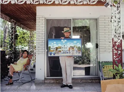  ??  ?? Cuban-born “Memory Artist” Mario Sanchez began painting in 1930 on paper bags and cedar wood boards. He is best known for bas-relief wood carvings that he painted over in vibrant colors, usually depicting scenes of Key West.