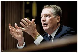  ?? AP ?? U.S. Trade Representa­tive Robert Lighthizer, shown testifying in June before the Senate Finance Committee, has met four times recently with House Democrats to discuss their concerns about the rewrite of a trade pact with Canada and Mexico, which requires congressio­nal approval.