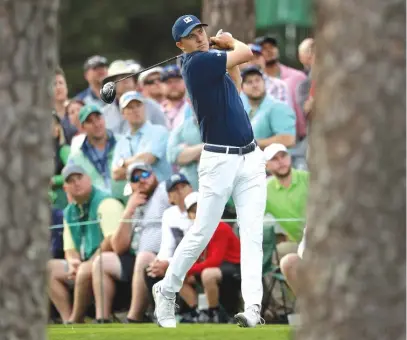  ?? PATRICK SMITH/ GETTY IMAGES ?? Jordan Spieth ( 6- under 66) had five consecutiv­e birdies on the back nine before finishing with a bogey.