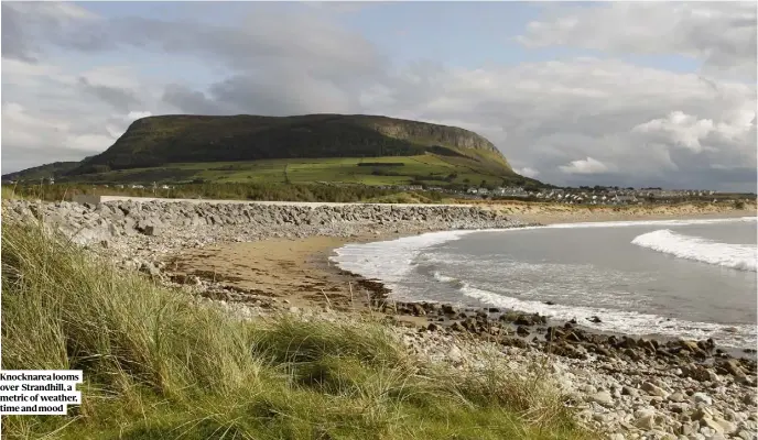  ??  ?? Knocknarea looms over Strandhill, a metric of weather, time and mood