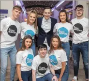  ?? ABOVE: (ABOVE LEFT) Photos Joe Hanley ?? Young American Garrett Tozzi with Gaelcholái­ste Chiarraí students Abbi Casey, Abbie Brosnan, Sophie Lowham, Sarah Horgan, Jeaic Ó Duagáin, Seosamh Clard agus Tomás Ó Hainiféin at the school’s musical with the Young American group at the Rose Hotel on Thursday;all the gang together.