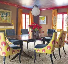  ?? ERIC PIASECKI ?? The dining room is a good place to go for a dramatic style, as in this space at the home of New York designer Katie Ridder.