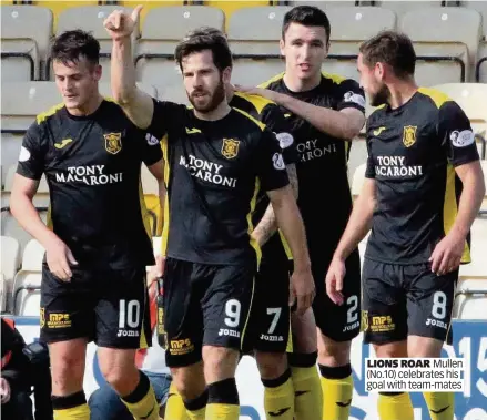  ??  ?? LIONS ROAR Mullen (No.10) celebrates his goal with team-mates