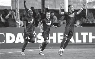  ?? XAVIER MASCARENAS/SACRAMENTO BEE ?? Sacramento Republic midfielder Luis Felipe, right, celebrates with teammates after his goal against the San Jose in a 2-0 win on May 25.