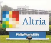 ?? Steve Helber Associated Press ?? ALTRIA GROUP, headquarte­red in Richmond, Va., is taking a major stake in Canada’s Cronos Group.