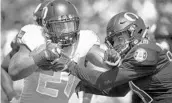  ?? ANDY NELSON/ASSOCIATED PRESS ?? Royce Freeman, left, and Oregon get the chance Sept. 9 to avenge last year’s 35-32 loss to Nebraska.