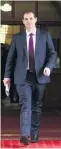  ?? GETTY IMAGES ?? Walking away . . . JamiLee Ross leaves Parliament after his explosive media conference yesterday.