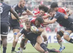  ??  ?? TOKYO: Pierre Schoeman of South Africa’s Bulls is tackled by Liaki Moli of Japan’s Sunwolves during their Super Rugby match in Tokyo, yesterday. — AP