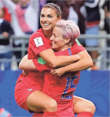  ?? MICHAEL CHOW/USA TODAY SPORTS ?? Alex Morgan, left, celebrates with Megan Rapinoe after scoring her fifth goal for the USA against Thailand on Tuesday.