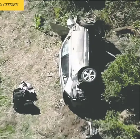  ?? KNBC VIA REUTERS ?? The vehicle of Tiger Woods, who was rushed to hospital after suffering multiple injuries, lies on its side after being involved in a crash Tuesday.