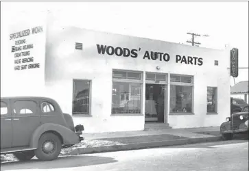  ?? Isaac M. Woods ?? THE WATTS business owned by the writer’s father, Isaac Woods, was spared during the August 1965 unrest.