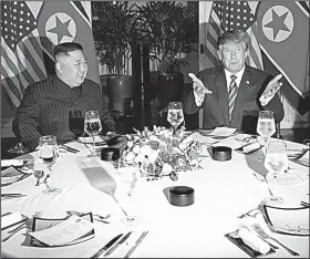  ?? AP/EVAN VUCCI ?? North Korean leader Kim Jong Un and President Donald Trump share dinner Wednesday evening in Hanoi, Vietnam. Most reporters were banned from the event because of “shouted questions,” White House press secretary Sarah Huckabee Sanders said.