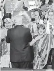  ?? RICK SCUTERI, AP ?? President Trump greets supporters in Phoenix Tuesday.