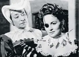  ??  ?? Como Ana de Mendoza de la
Cerda en La princesa de Éboli
(1955), dirigida por Terence Young. De Havilland dio vida a la esposa de un noble portugués privado del rey Felipe II. En la escena, con Francoise Rosay