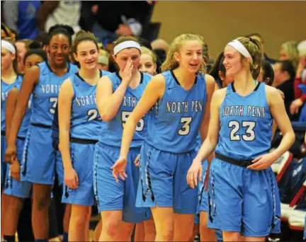  ?? AUSTIN HERTZOG — DIGITAL FIRST MEDIA ?? North Penn’s Sam Carangi (23) and Cayla Sharkey (3) share a laugh as the Knights line up following their victory over Cedar Crest in a PIAA Class 6A first round game Friday at Lebanon.