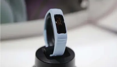  ?? AP file ?? APP VULNERABIL­ITY: Garmin's Vivofit 2 fitness tracker is shown at the Internatio­nal CES trade show, in Las Vegas in 2015. Garmin Connect, an app and website that works with the company's popular line of fitness watches, was out of service on Friday and the company attributed it to a cyber attack.