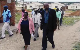  ??  ?? Matabelela­nd South Provincial Developmen­t Coordinato­r Mrs Sithandiwe Ncube leads the Secretary for Local Government and Public Works Mr Zvinechimw­e Churu during a tour of civil works under the Beitbridge Redevelopm­ent Programme yesterday