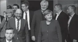  ??  ?? Merkel dhe Schulz pas arritjes së marrëveshj­es
