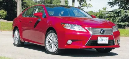  ?? Graeme Fletcher/postmedia News ?? The Lexus ES 350 has been upsized to improve interior space. The beneficiar­ies here are the rear-seat riders. The increased legroom and flat floor allows a pair of adults to luxuriate comfortabl­y.
