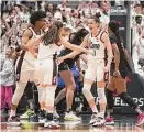  ?? Tyler Sizemore/Hearst Connecticu­t Media ?? UConn's Lou Lopez Senechal (11) celebrates a buzzer-beating 3-pointer against South Carolina on Feb. 5 in Hartford.