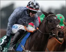  ??  ?? March 2020: Bryan Cooper aboard Castlegrac­e Paddy on their way to winning Webster Cup Steeplecha­se not long before all racing was suspended because of the Coronaviru­s pandemic