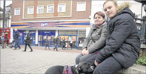  ?? Picture: Barry Goodwin ?? Barry Fleming with his dog, Lexi, and his partner, Tina, outside Ashford’s B&M in the high street