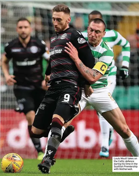  ??  ?? Louis Moult takes on the Celtic defence during his time in the Scottish Premiershi­p with Motherwell.