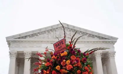  ?? AFP/Getty Images ?? Immigratio­n activists at the supreme court on Tuesday urged the justices to end the controvers­ial program. Photograph: Stefani Reynolds/