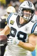  ?? AP ?? Greg Olsen decides it’s time to leave field and take seat in press box.