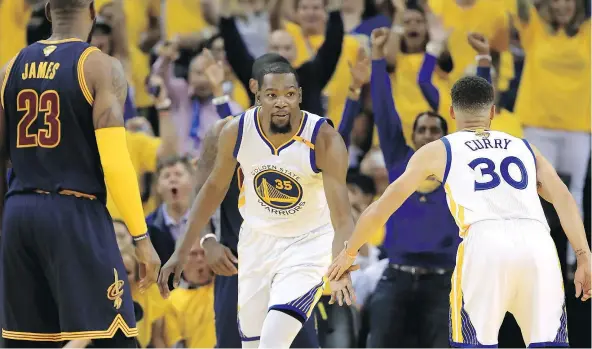  ?? — GETTY IMAGES ?? Kevin Durant and Stephen Curry have learned from each other and improved each other’s game from the day Durant joined the Warriors in the off-season. The dynamic duo presents numerous issues for LeBron James and the Cavaliers in the NBA Finals.