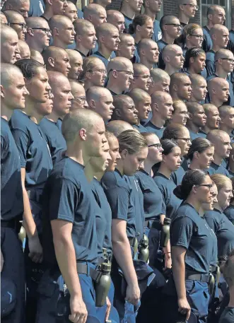  ?? AP FILE ?? IN A SEA OF FACES: The Coast Guard Academy’s Class of 2022 pose for a photo in July. The academy is being investigat­ed for alleged racial discrimina­tion.