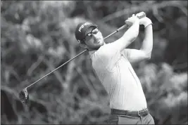  ?? ASSOCIATED PRESS ?? ANDREW LANDRY hits off the second tee during the third round of the John Deere Classic golf tournament, Saturday at TPC Deere Run in Silvis, Ill.