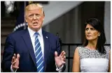  ?? AL DRAGO / NEW YORK TIMES ?? Nikki Haley, the United Nations ambassador, looks on as President Donald Trump speaks Friday at his golf club in Bedminster, N.J.