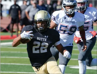  ?? MATT BATES — ENTERPRISE-RECORD FILE ?? Butte College running back Avery McCuaig carries the ball against College of the Siskiyous last October at Chico High.