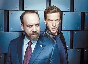  ??  ?? Enemigos íntimos. Paul Giamatti y Demian Lewis como el fiscal y el financista.