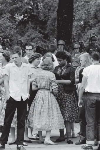 ??  ?? Recess on the first day of integratio­n at Little Rock Central High School, Little Rock, Arkansas, 1957