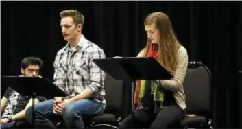  ??  ?? RYAN LUCAS Peter Hargrave and Megan Medley perform in a reading of the play “Feed.” The reading was part of a previous Cleveland Play House New Ground Theatre Festival.