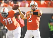  ?? Sue Ogrocki / Associated Press ?? Texas faces Oklahoma State star Mason Rudolph Saturday after taking on Sam Darnold and Baker Mayfield.