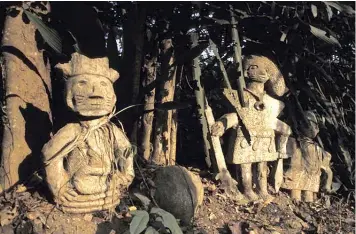  ??  ?? Art works at the Osun Osogbo Sacred Grove, a UNESCO World Heritage site