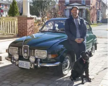  ?? MATT STIMPSON PHOTOS ?? Matt Stimpson with his vintage Saab and black lab, Olive, just before the beauty was put away for the winter.