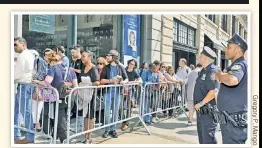  ??  ?? HER BASE: People line up outside the Union Square Barnes & Noble Tuesday to see Hillary Clinton. Some arrived the night before.