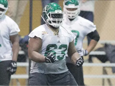  ?? TROY FLEECE ?? Roughrider­s offensive lineman Derek Dennis practised Wednesday after missing three games with back spasms.