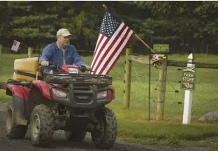  ??  ?? James Matheny (Army National Guard) and his wife operate Stone
Wall Angus in Fairplay, Maryland, where they raise grain-fed beef and are active in several USDA programs including FSA Farm Loans.