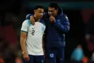  ?? Photograph: Tom Jenkins/ The Guardian ?? Trent Alexander-Arnold chats with England teammate Jude Bellingham at Wembley last month.