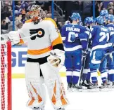  ?? THE ASSOCIATED PRESS/FILES ?? Michal Neuvirth, who has been injured for much of the season, is one of seven goalies the Philadelph­ia Flyers have employed between the pipes in just 43 games so far this NHL campaign.