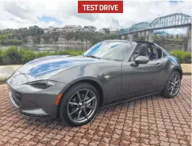  ?? STAFF PHOTO BY MARK KENNEDY ?? The new Mazda Miata hard-top convertibl­e is a two-seat gem.